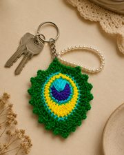 Handmade peacock-feather-inspired keychain 3