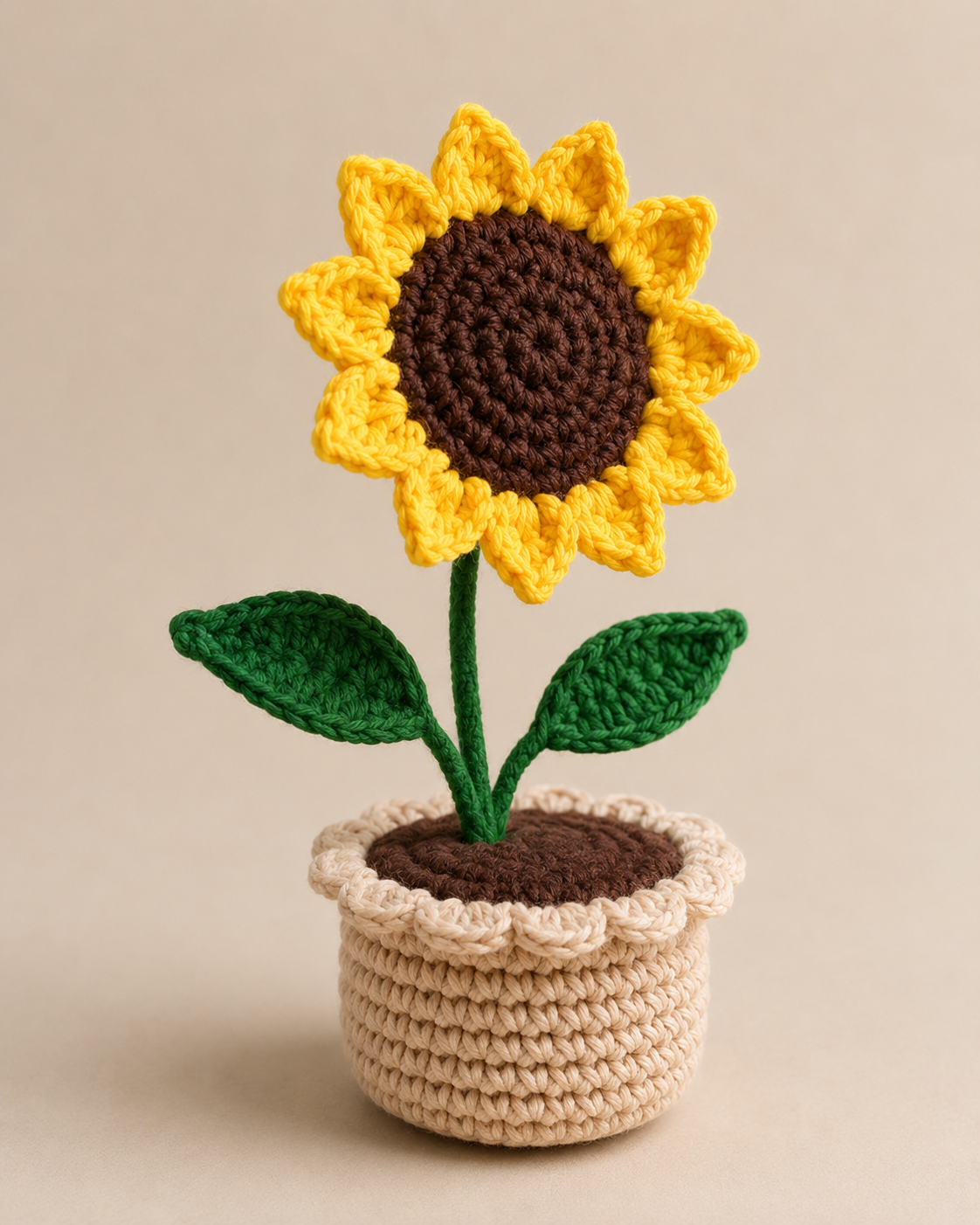 Crocheted sunflower in a small beige pot 3